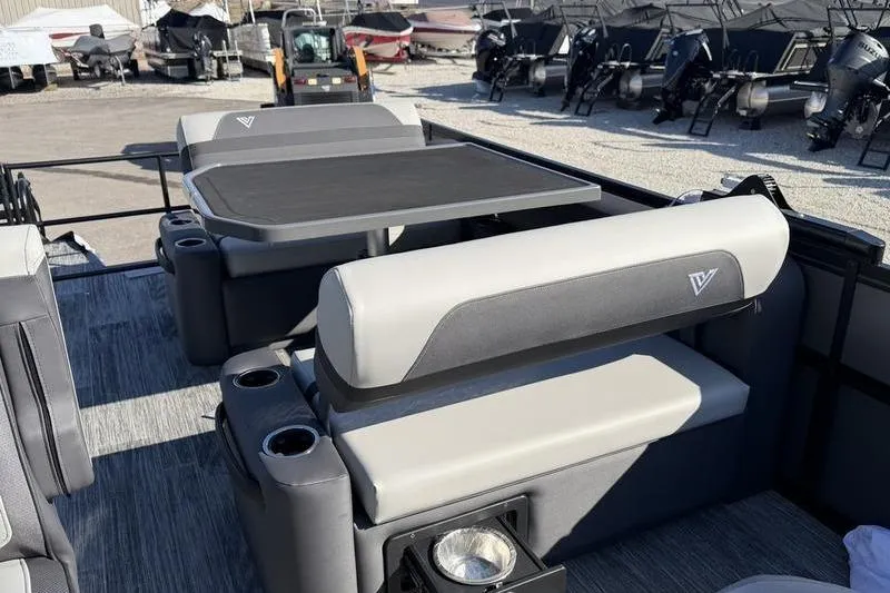 Slide: The Image of Viaggio X22D 2026 boat interior with seating and table, showcasing modern design and comfort. - 6