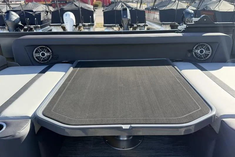 Slide: The Image of 2026 Viaggio X22D boat interior with seating and speakers, showcasing modern design. - 9