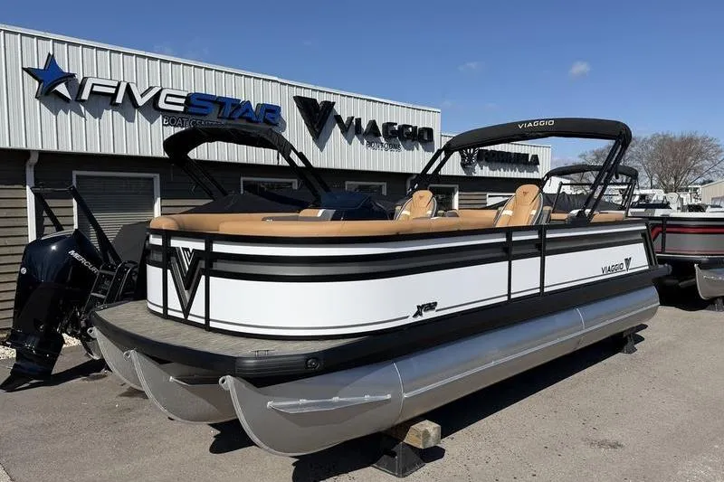 The Image of 2026 Viaggio x22u pontoon boat displayed at dealership, featuring sleek design and modern amenities. - 0