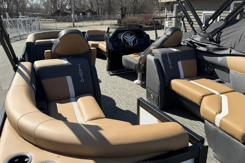 Slide: The Image of Luxurious 2026 Viaggio x22u boat interior with tan and gray seating. - 11