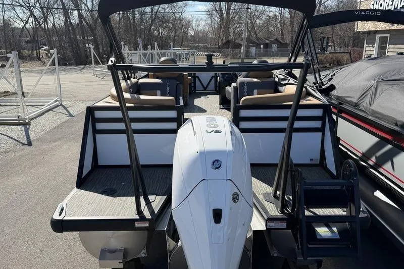 Slide: The Image of 2026 Viaggio x22u pontoon boat with powerful V12 engine, docked outdoors. - 3