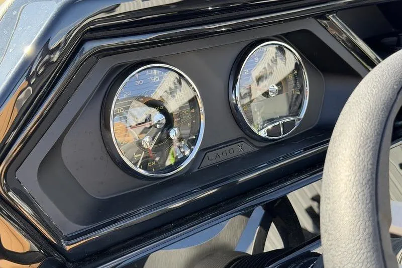 Slide: The Image of Dashboard of a 2026 Viaggio x22u with analog gauges and sleek design. - 7