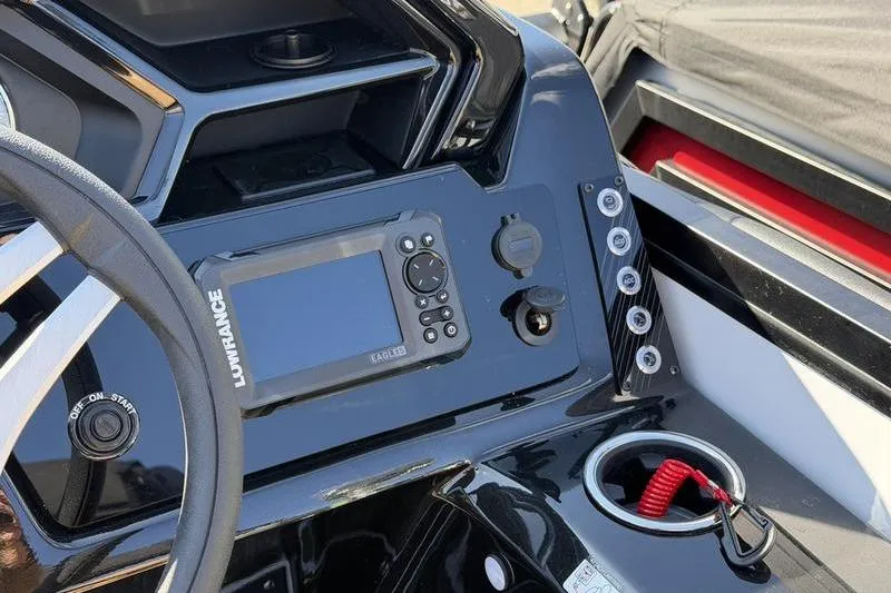 Slide: The Image of Dashboard of a 2026 Viaggio x22u boat featuring a Lowrance navigation system. - 9