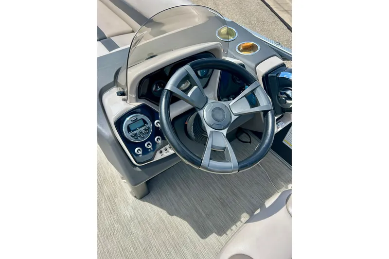 Slide: The Image of Steering console of 2019 Princecraft Vectra 21 boat with modern controls and dashboard. - 26