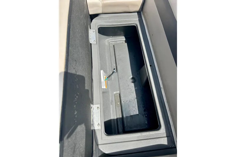 Slide: The Image of Storage compartment of a 2019 Princecraft Vectra 21 boat, open and empty. - 34