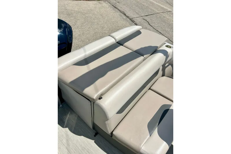 Slide: The Image of 2019 Princecraft Vectra 21 boat seating with beige upholstery in sunlight. - 40
