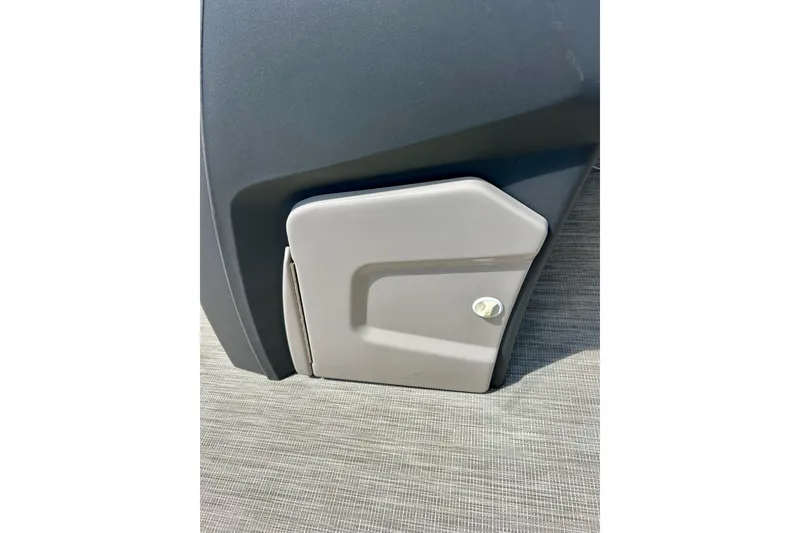 Slide: The Image of 2019 Princecraft Vectra 21 boat detail, featuring a gray storage compartment on deck. - 47