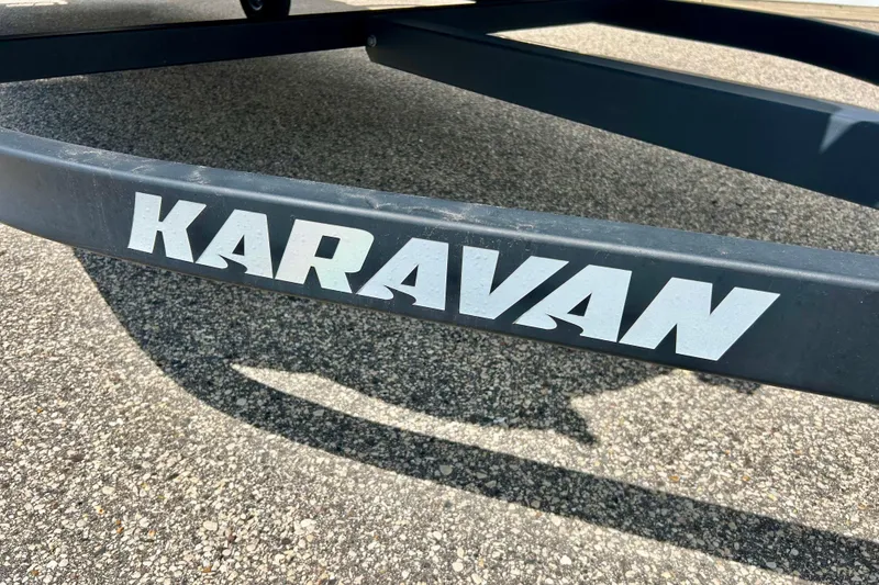 Slide: The Image of Karavan trailer for 2019 Princecraft Vectra 21 on asphalt surface. - 9
