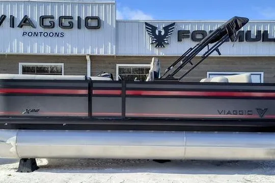 The Image of 2026 Viaggio X22S pontoon boat displayed outside dealership. - 0