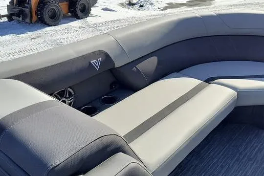 Slide: The Image of Luxurious seating in 2026 Viaggio X22S boat, featuring sleek design and cup holders. - 10