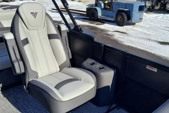 Slide: The Image of Luxurious Viaggio X22S 2026 boat seat with cup holders, set against a snowy backdrop. - 16