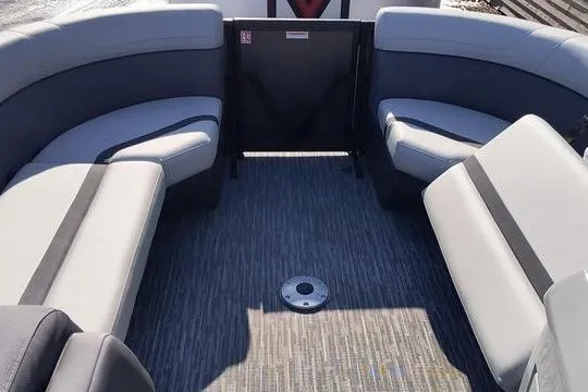 Slide: The Image of Interior of 2026 Viaggio X22S boat with gray seating and carpeted floor. - 19