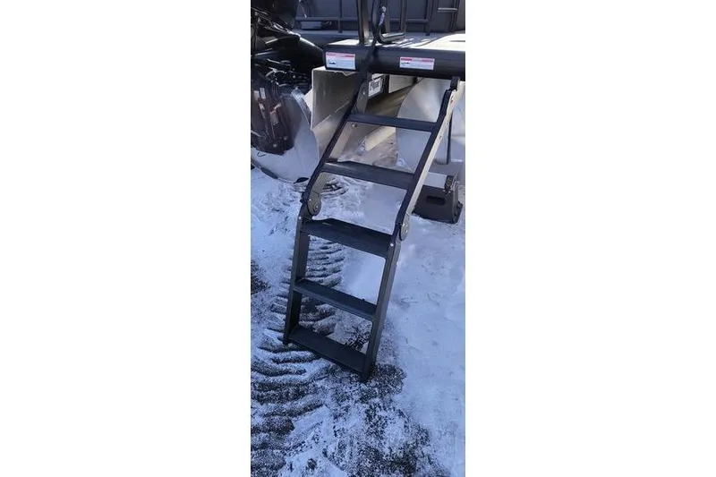 Slide: The Image of Sturdy metal steps on a Viaggio X22S 2026 model, set against a snowy background. - 20