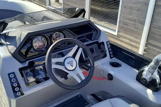 Slide: The Image of 2026 Viaggio X22S boat dashboard with modern steering wheel and controls. - 4