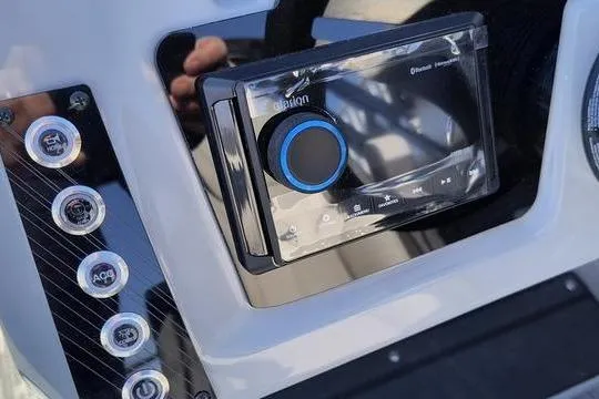 Slide: The Image of Control panel of 2026 Viaggio X22S boat featuring modern audio system and buttons. - 5