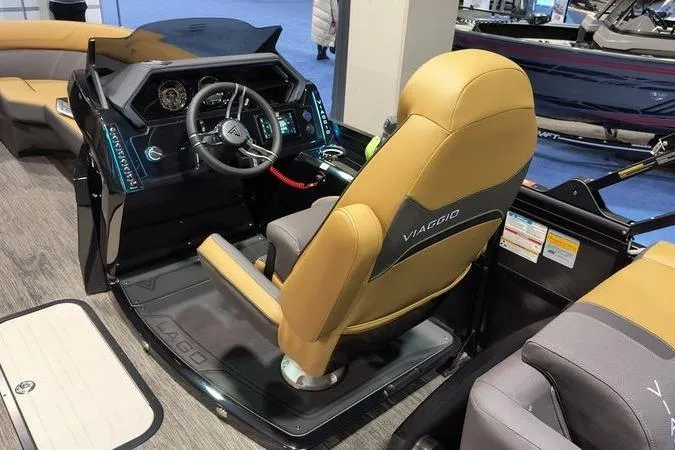 Slide: The Image of Captain's seat and dashboard of 2026 Viaggio Z22U boat, featuring modern controls and design. - 5