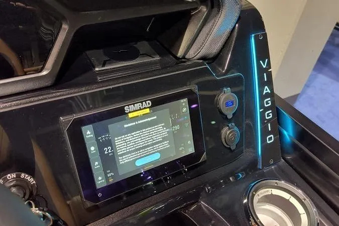 Slide: The Image of Dashboard of 2026 Viaggio Z22U with Simrad display and illuminated controls. - 6