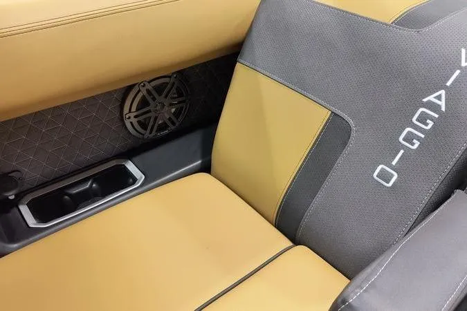 Slide: The Image of Luxurious Viaggio Z22U 2026 interior with tan and gray leather seats, featuring stylish speaker design. - 8