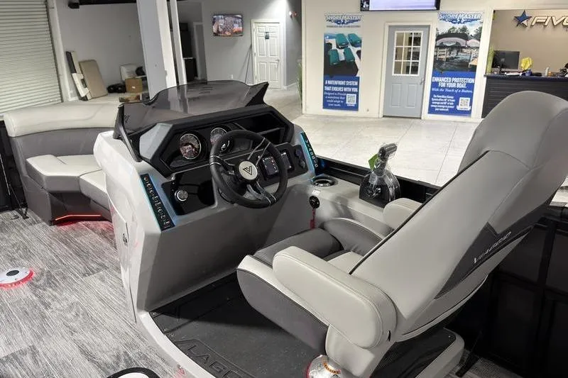 Slide: The Image of Interior of a 2026 Viaggio Z22S boat with modern helm and seating. - 10