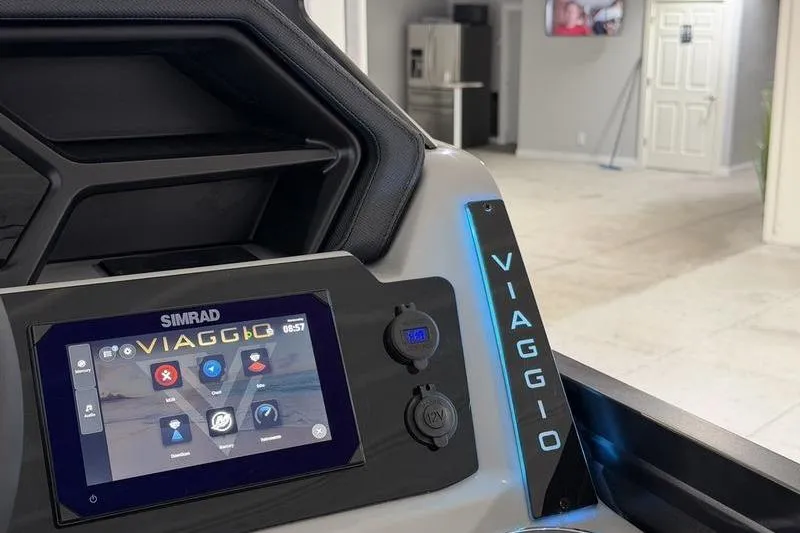 Slide: The Image of 2026 Viaggio Z22S dashboard with Simrad display in a modern interior setting. - 14