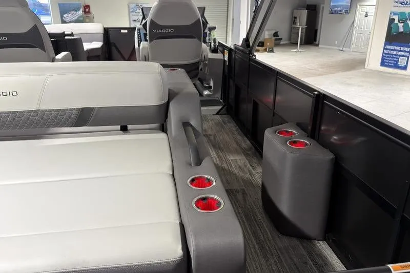 Slide: The Image of Interior of 2026 Viaggio Z22S boat with modern seating and cup holders. - 18