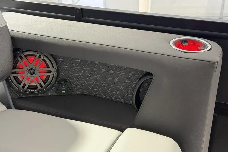 Slide: The Image of Interior of 2026 Viaggio Z22S with speaker and cup holder. - 19