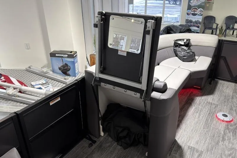 Slide: The Image of Interior of a 2026 Viaggio Z22S boat with seating and storage compartments. - 22