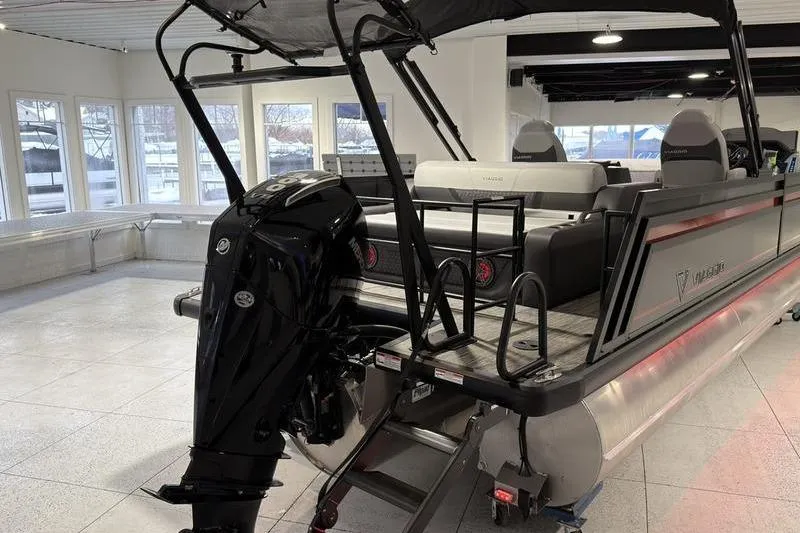 Slide: The Image of 2026 Viaggio Z22S pontoon boat with outboard motor in showroom. - 4