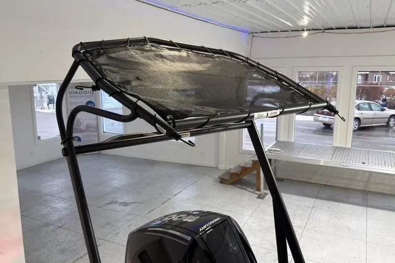 Slide: The Image of 2026 Viaggio Z22S boat canopy in showroom, showcasing sleek design and modern features. - 5