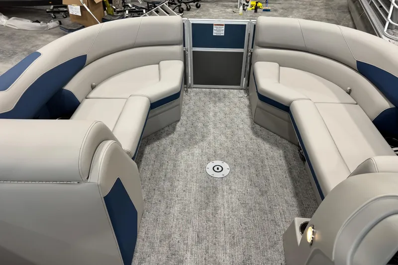 Slide: The Image of Interior of 2026 Berkshire 24 UL pontoon boat with plush seating and modern design. - 10