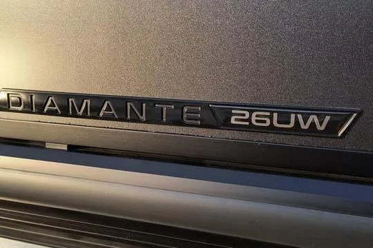 Slide: The Image of Viaggio Diamante UWA 2026 emblem on vehicle exterior, showcasing model branding. - 10