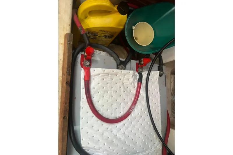 Slide: The Image of Engine component of a 2001 Beneteau Oceanis 473 sailboat, featuring a filter with barcode. - 111