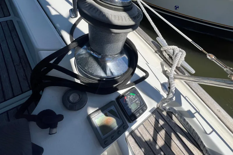 Slide: The Image of Storage compartment of a 2001 Beneteau Oceanis 473 sailboat with coiled cables and equipment. - 49