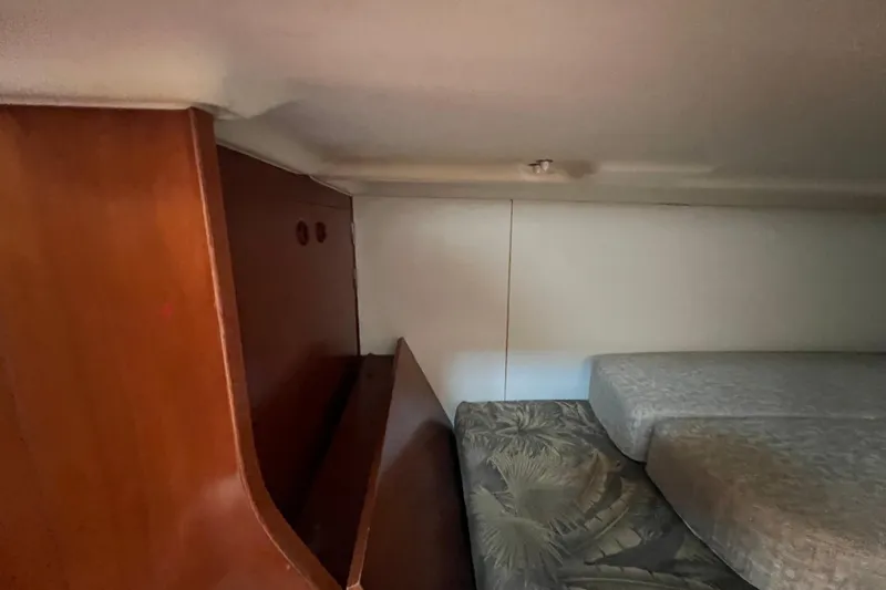 Slide: The Image of Open storage compartment on a 2001 Beneteau Oceanis 473 sailboat. - 74