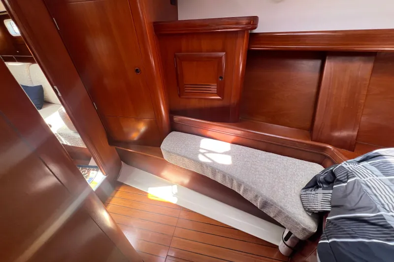 Slide: The Image of Shower area in 2001 Beneteau Oceanis 473 yacht, featuring compact design and white interior. - 97