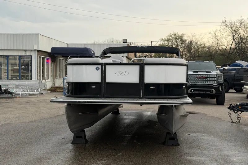 Slide: The Image of 2023 Bentley Pontoons Legacy 200 Cruise pontoon boat displayed outdoors. - 2