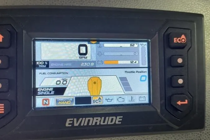 Slide: The Image of Evinrude engine display on a 2017 Larson Escape 213, showing RPM and fuel consumption. - 17