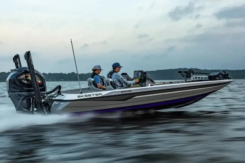 The Image of 2026 Skeeter FXR21 FLEX boat in showroom, featuring sleek design and powerful engine. - 0