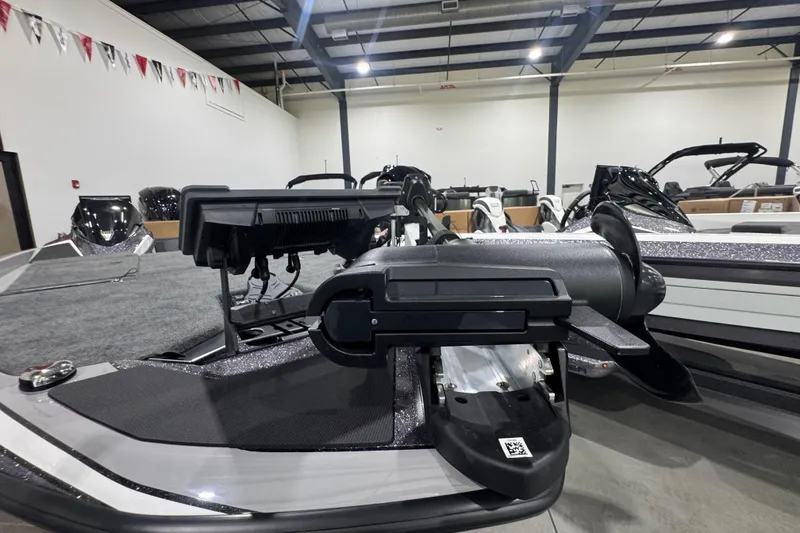 Slide: The Image of Manufacturer Provided Image: 2026 Skeeter FXR21 FLEX boat with advanced navigation system and sleek interior design. - 15