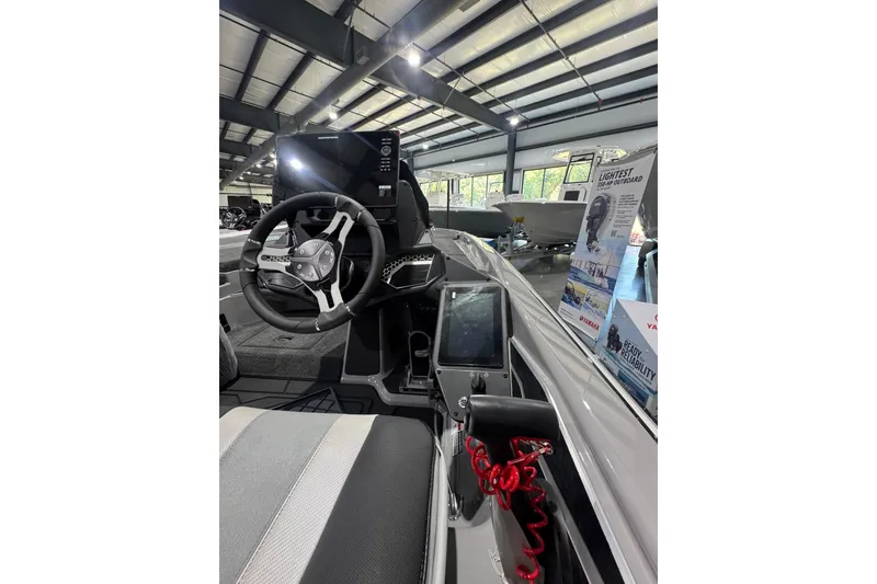 Slide: The Image of Manufacturer Provided Image: 2026 Skeeter FXR21 FLEX boat, top view, showcasing interior layout and seating arrangement. - 22