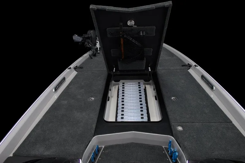 Slide: The Image of 2026 Skeeter FXR21 FLEX boat interior with advanced navigation system in showroom. - 4