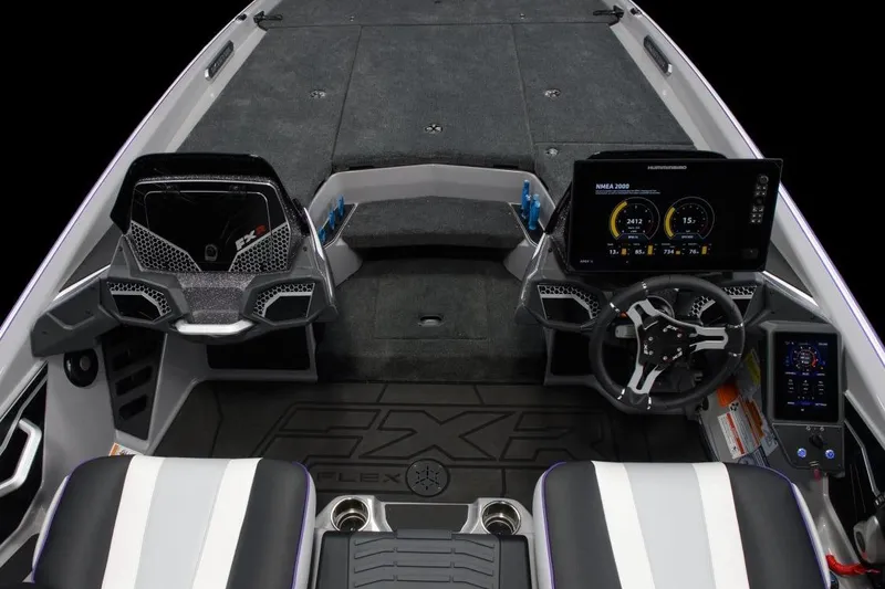 Slide: The Image of 2026 Skeeter FXR21 FLEX boat in showroom, featuring Yamaha outboard motor display. - 5