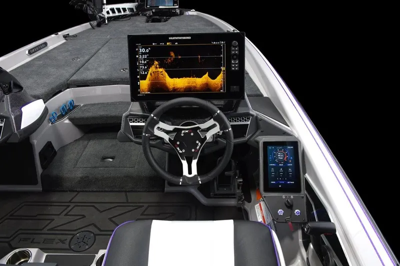 Slide: The Image of 2026 Skeeter FXR21 FLEX boat displayed at Boating Atlanta showroom. - 6