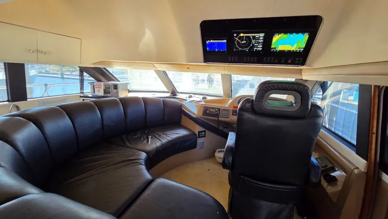 Slide: The Image of Interior of 2000 Carver 450 Voyager Pilothouse with leather seating. - 10