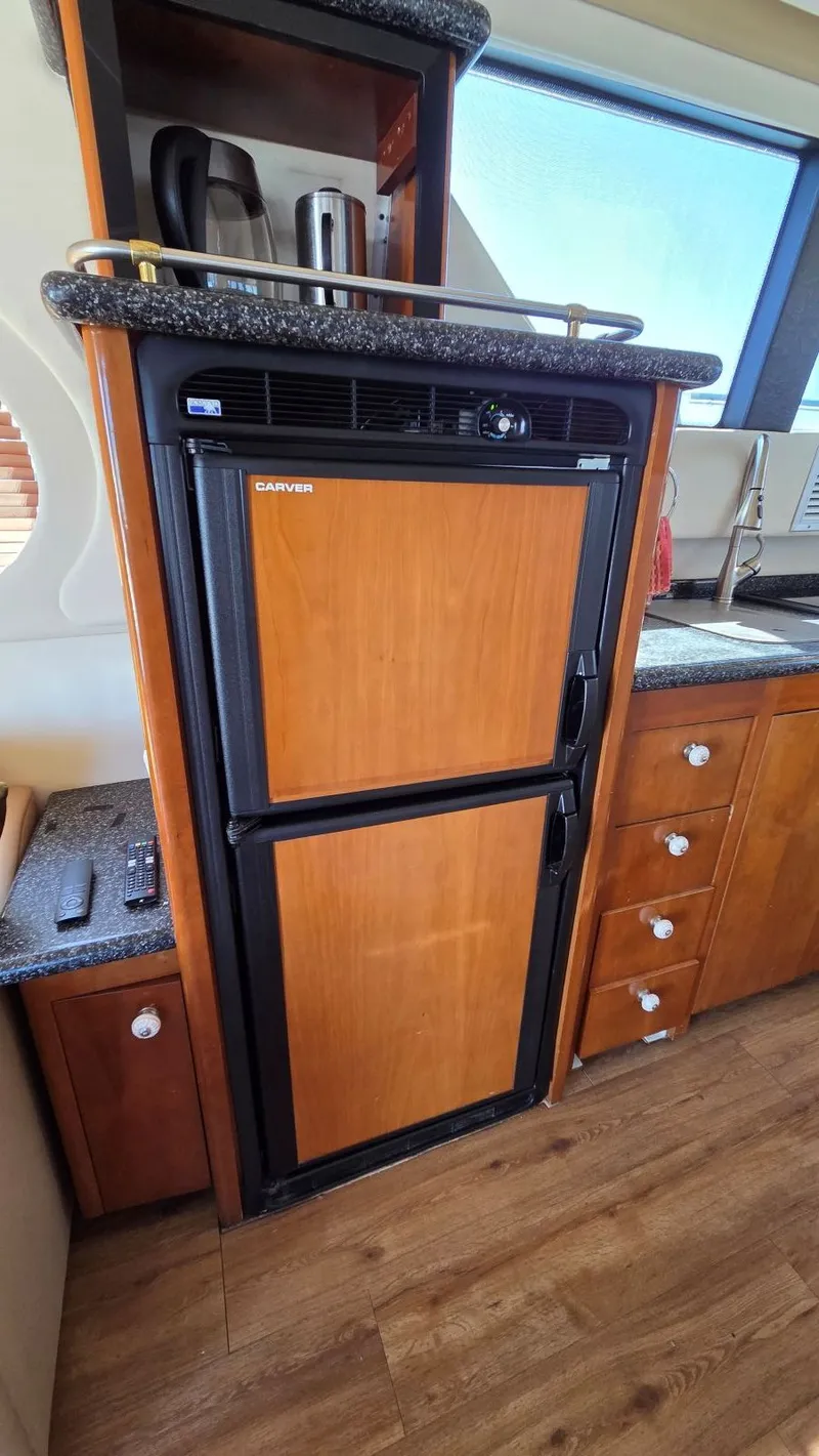 Slide: The Image of Kitchen area of Carver 450 Voyager Pilothouse yacht, year 2000. - 19