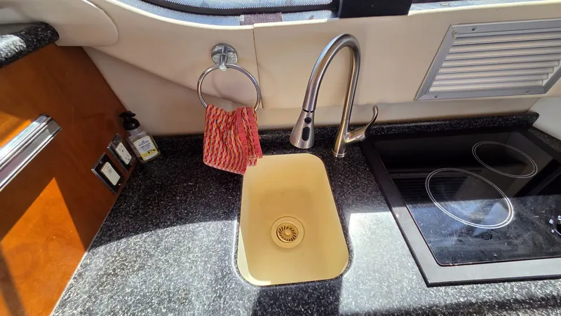 Slide: The Image of Kitchen area of the 2000 Carver 450 Voyager Pilothouse. - 23