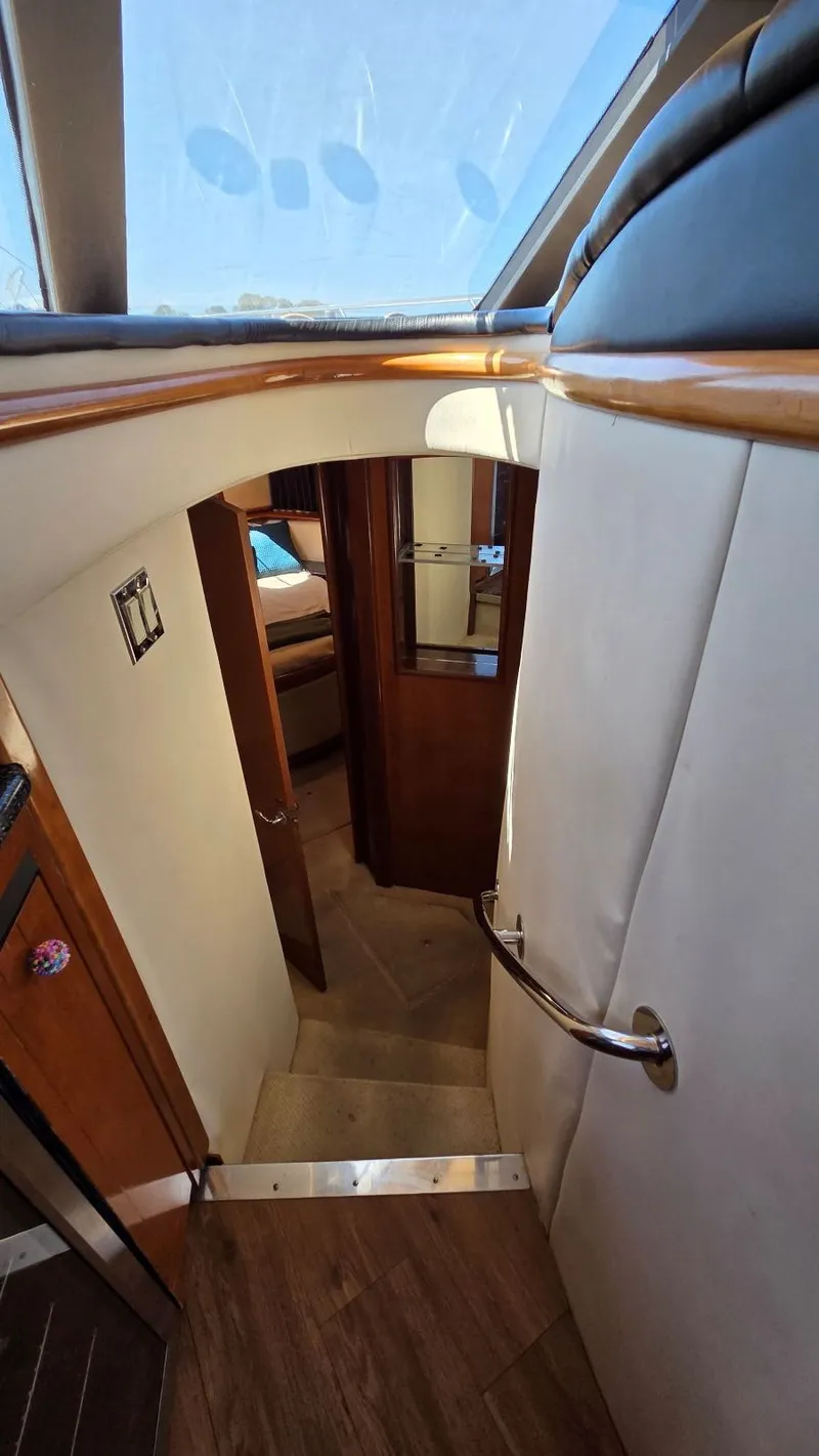 Slide: The Image of Interior of 2000 Carver 450 Voyager Pilothouse, stairway leading to cabin. - 25