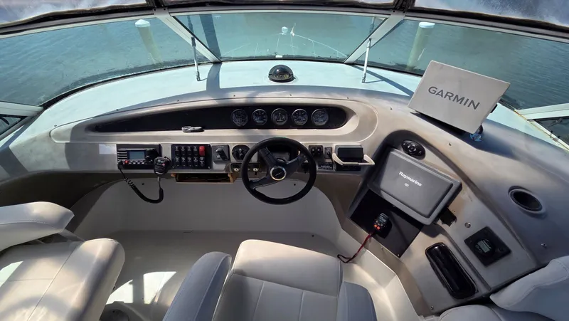 Slide: The Image of Interior of 2000 Carver 450 Voyager Pilothouse with Garmin navigation. - 46