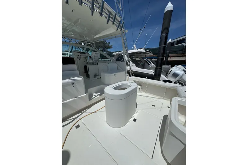 Slide: The Image of 1998 Cabo Yachts 35 Express boat deck with seating and equipment. - 72