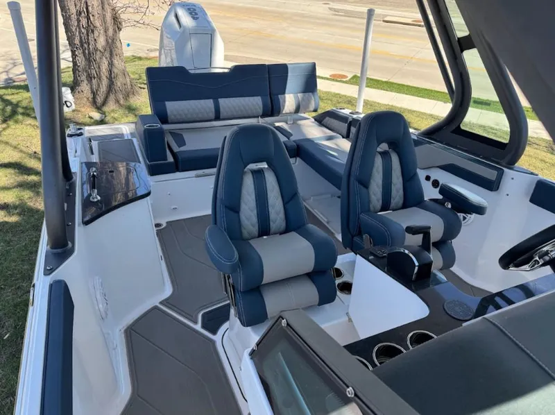 Slide: The Image of Interior of 2025 Monterey Elite 27 OB with luxurious seating. - 4